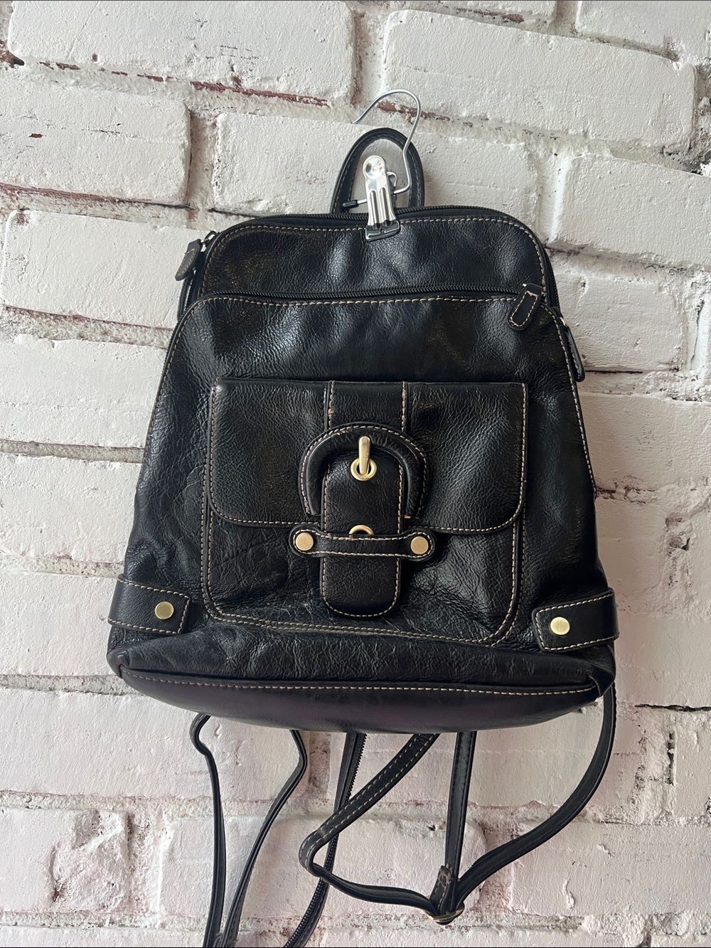 Sleek Black Leather Mini Backpack with Front Buckle Accent